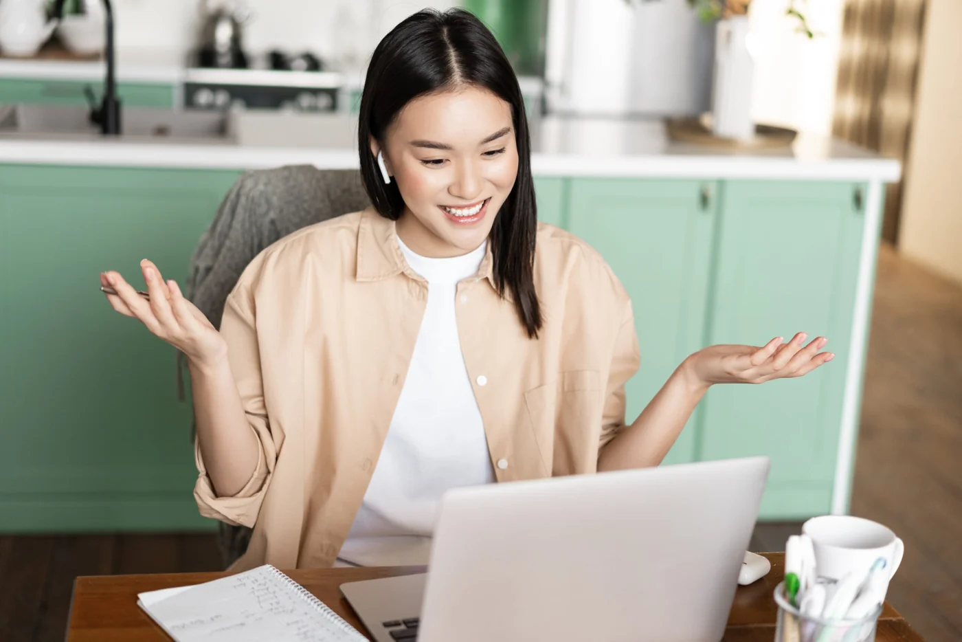 Online study with a laptop and learning materials